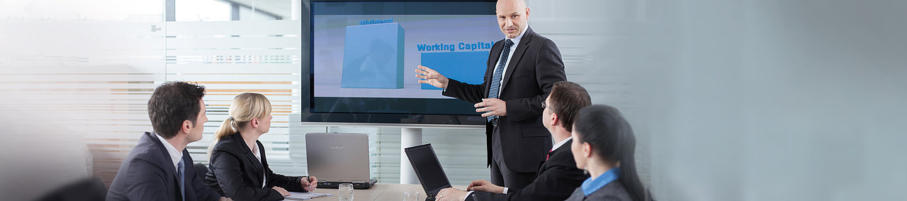 A business team in the middle of a meeting.