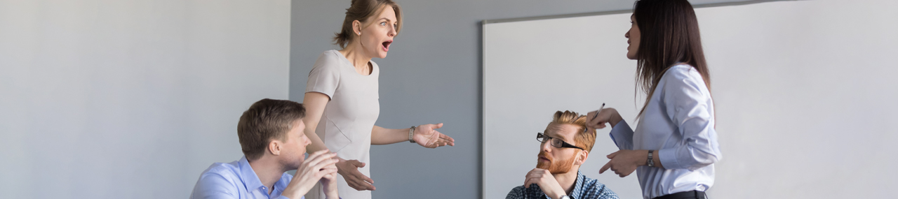 A woman shocked during her conversation with her team. 