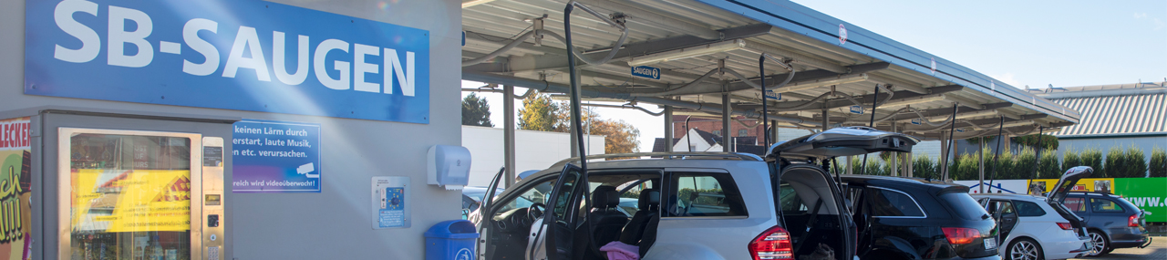 A car wash with a vacuum station for extra incentive as a way to increase passive income.