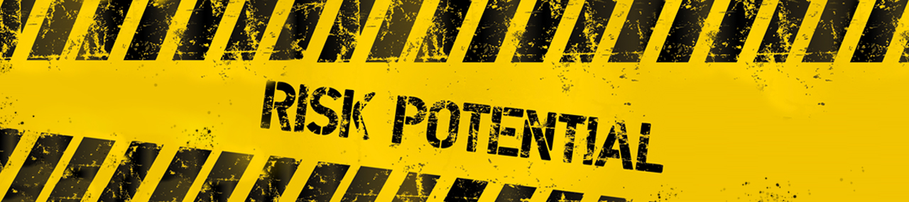 A yellow sign that says Risk Potential with cation tape wrapped around it.