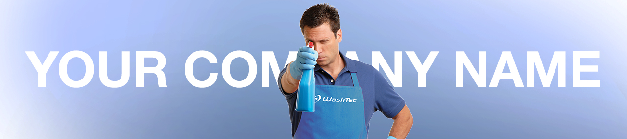 A man wearing a WashTec apron with window cleaner in front of a window that say "your company name".