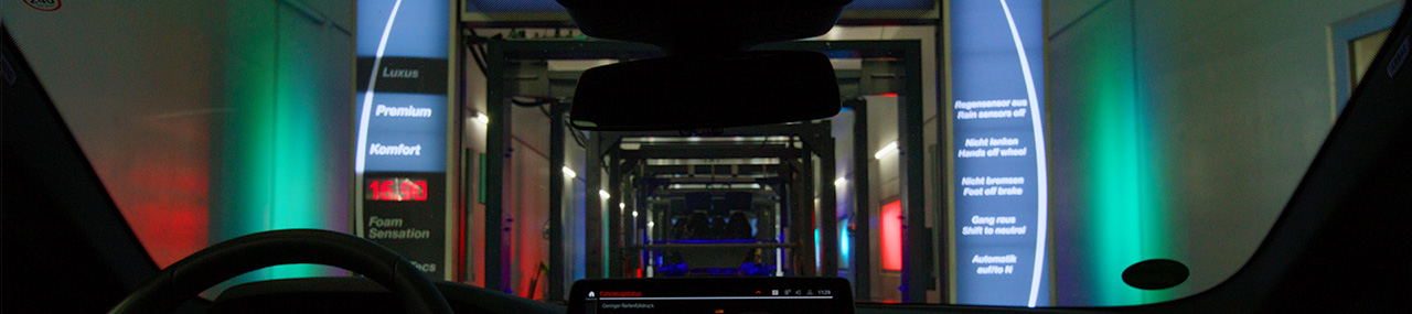Interior view from inside of a car inside of a Mark VII Tunnel car wash.